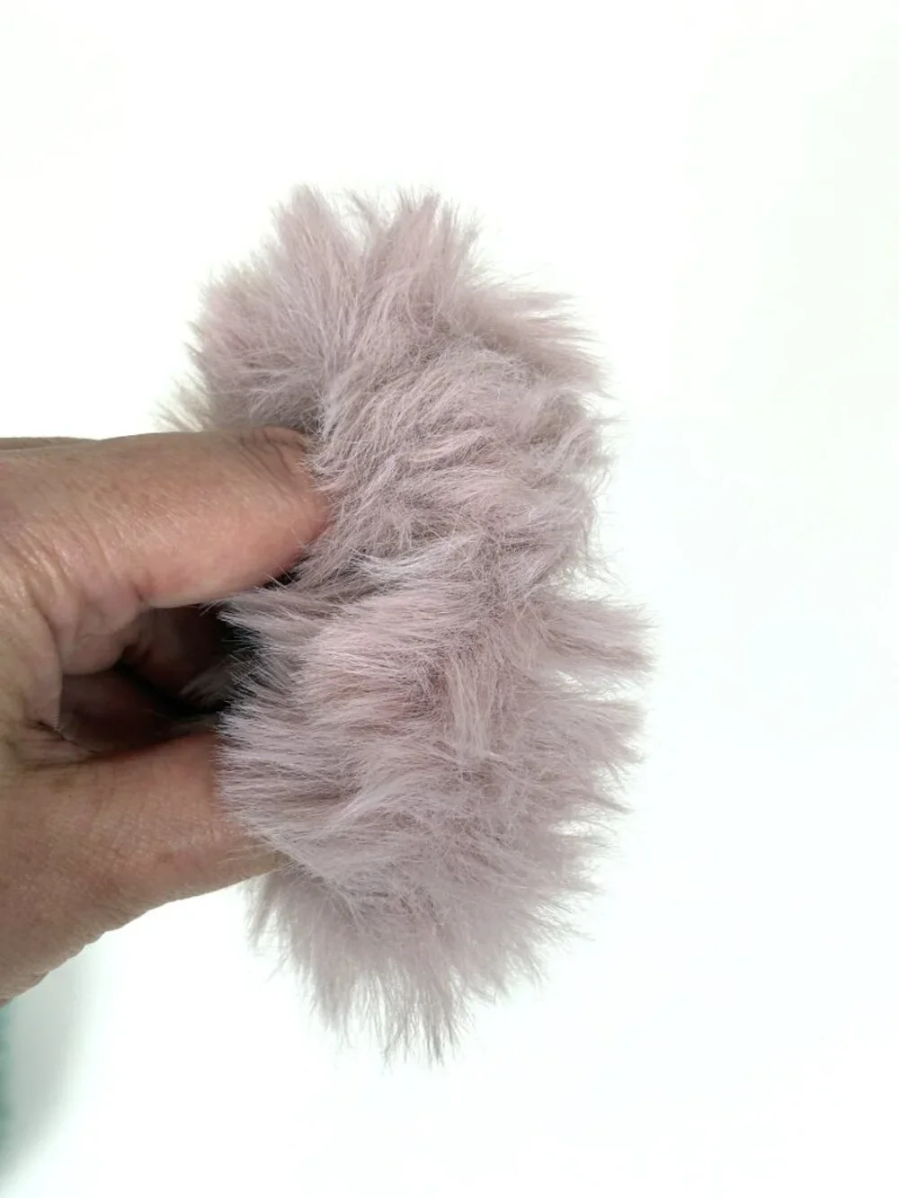 Cute set of soft fluffy fuzzy faux fur scrunchies pom pom hair ties. New